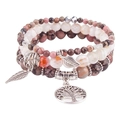Detailed set of bohemian beaded bracelets featuring tree of life and leaf silver charms - Rhodonite with Black Lines