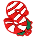 Macro detail of red and white candy cane shoe charm accessory with green holly leaves - Candy Cane