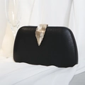 Elegante borsa da sera nera in PU con chiusura a foglia dorata e texture a righe - Nero