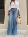 Close-up of light blue high-waisted wide-leg jeans featuring premium washed denim texture - S / Denim Blue