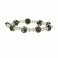 Close-up of beaded bracelet with white faux pearls and green ceramic flower charms - Imitation Pearl + Grass Green Flower