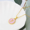 Gold stainless steel necklace with pink shell oval pendant featuring letter F - Pink-F