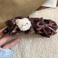 Close-up of a plush bear and plaid bow on a brown fabric hair clip for women - Twist Clip - Coffee