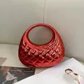 Metallic red quilted Hobo clutch bag with vibrant diamond pattern and glossy finish - Red