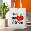 White canvas tote bag with It takes a BIG heart to shape little minds teacher quote - STD67-G (Shape Minds)