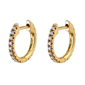 Macro detail of 14k gold hoop earrings with sparkling pave-set round diamonds - Gold White Stone