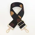 Detailed view of jacquard heart pattern on adjustable nylon bag strap with gold hooks - No. 27 + Gold Hook (Black with Brown/Beige Heart)