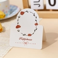 Biglietto d'auguri romantico 'Happiness' con ghirlanda floreale e fiocco elegante - Felicità