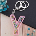 Pink acrylic letter Y keychain featuring colorful glitter sequins and silver lobster clasp - Letter Y