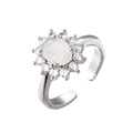 Detail of white oval opal halo ring with cubic zirconia accents and adjustable band - Silver Band/White Gemstone