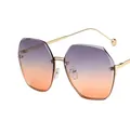Chic rimless oversized sunglasses with grey to pink gradient lenses and gold metal frame - Grey Orange Gradient