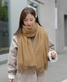 Elegant camel wool blend scarf with classic tassels styled on a model in city setting - 200*70cm / Velvet-Touch Tassel Style / Dark Camel