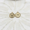 Golden Chinese zodiac pig and ingot charms for DIY jewelry making on white lace background - Fortune Pig