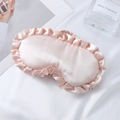 Schlafmaske aus Satin in Hellrosa mit eleganten Rüschen und elastischem Kopfband - Nute Rosa