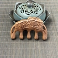Handcrafted sandalwood massage comb with lotus carving and five round wide teeth - Golden Sandalwood Single-Sided Lotus Carving