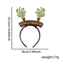 Halloween headband with green zombie hands, bloodshot eyeballs and orange glitter lettering - Eyeball Zombie Hand