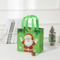 Green Christmas non-woven tote bag featuring cartoon Santa Claus with festive decorations - 29x27x12cm / Green