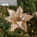 Fleur de Noël artificielle champagne de 27cm avec paillettes sur branche de sapin - Bleu foncé