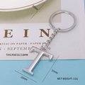 Polished silver metal letter T keychain with 3.8mm thickness and stainless steel ring - Letter-T