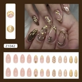 Faux ongles amande à paillettes champagne avec détails dorés et strass brillants - Style Ruban Champagne (Z1042) / Type à Colle
