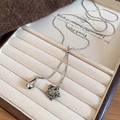 Silver snake chain necklace with star-shaped stone and metal teardrop charms - Silver Snake Chain Dalmatian Stone Star Teardrop Necklace