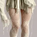White jacquard lace fishnet tights featuring delicate floral rose patterns in a slim fit - One Size / Cream
