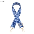 Close-up of blue and white geometric pattern bag strap with gold metal buckles - L-19 Royal Blue