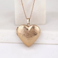 Vintage heart locket necklace in rose gold finish with detailed floral engraving - Wave Pattern Heart/Rose Gold