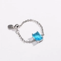 Adjustable silver chain ring featuring rectangular blue zircon and heart charm - Sea Blue Zircon - White Gold