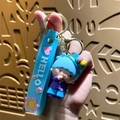 Cute blue cartoon star character keychain with floral hat and silicone wrist strap - Sanrio Floral Series-Little Twin Stars Kiki