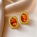 Vintage style amber oval earrings with textured gold frame on silk fabric background - Style 113# S925 Silver Pin Coffee Oval Resin Studs