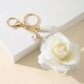Elegant white rose keychain with white tassel and pearl charm on a gold-plated metal clip - White