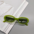 Grass green oval sunglasses with retro slim plastic frames and dark tinted lenses - Jelly Green