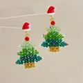 Detail of beaded Christmas tree earrings with a festive red hat and colorful crystals - Christmas Tree Hat-Silver Pin / Stud Earrings
