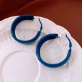 Macro shot of large navy blue enamel hoop earrings on a white vintage ceramic tray - Silver Earring Post-Blue