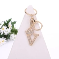 Golden letter V keychain with crown and sparkling crystals on a metal lobster clasp - Letter V / Gold