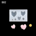 Silicone mold for DIY heart and star shapes with finished resin craft examples - B82