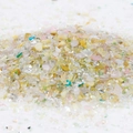 Detailed close-up of 2-8mm colorful crushed glass stones and tiny pearls for DIY crafts - Style 5