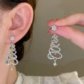 Detailed view of colorful rhinestones on a Christmas tree drop earring for women - Silver Red Green Zirconia