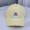 Detailed view of yellow distressed baseball cap with MJ FASHION embroidery and torn brims - One Size (58-60cm) / Yellow