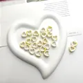 Yellow marble patterned heart-shaped ceramic beads for DIY jewelry making sets - White Yellow Marble