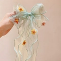Light green tulle bow hair clip for girls featuring small pink and yellow floral accents - Green With Mini Flowers Streamer
