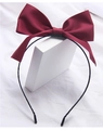 Elegant dark red satin bow headband with slim black frame on a clean white background - Headband / Red