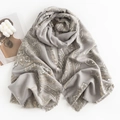 Elegant grey and beige paisley pattern cashmere scarf with decorative tassels on white background - Paisley Light Grey