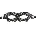 Detailed view of intricate black lace masquerade mask with ornate embroidery patterns - Six Petals
