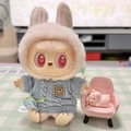 Labubu doll in white rabbit hoodie and blue knit sweater with yellow smiley face - Blue Smiley Face Pin / First And Second Generation Keychains Are Compatible With La Cloth Dolls. Dolls Not Included.