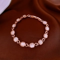 Bracelet élégant en or rose avec pierres oeil-de-chat carrées roses et fermoir déployant - Style 71# Or Rose Géométrique