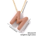 Brown letter M pendant necklace in gold finish with measurements and weight details - Letter M (N01210-M)
