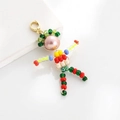 Pink handmade beaded doll pendant with colorful beads and golden lobster clasp - Champagne
