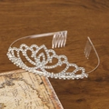 Elegant silver bridal crown with sparkling rhinestones and integrated hair comb - Style B